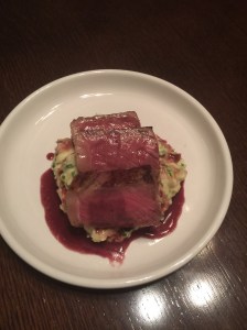Steak with Red Wine Sauce over Smashed Potatoes